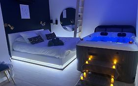 Suite romantique avec Spa et filet suspendu